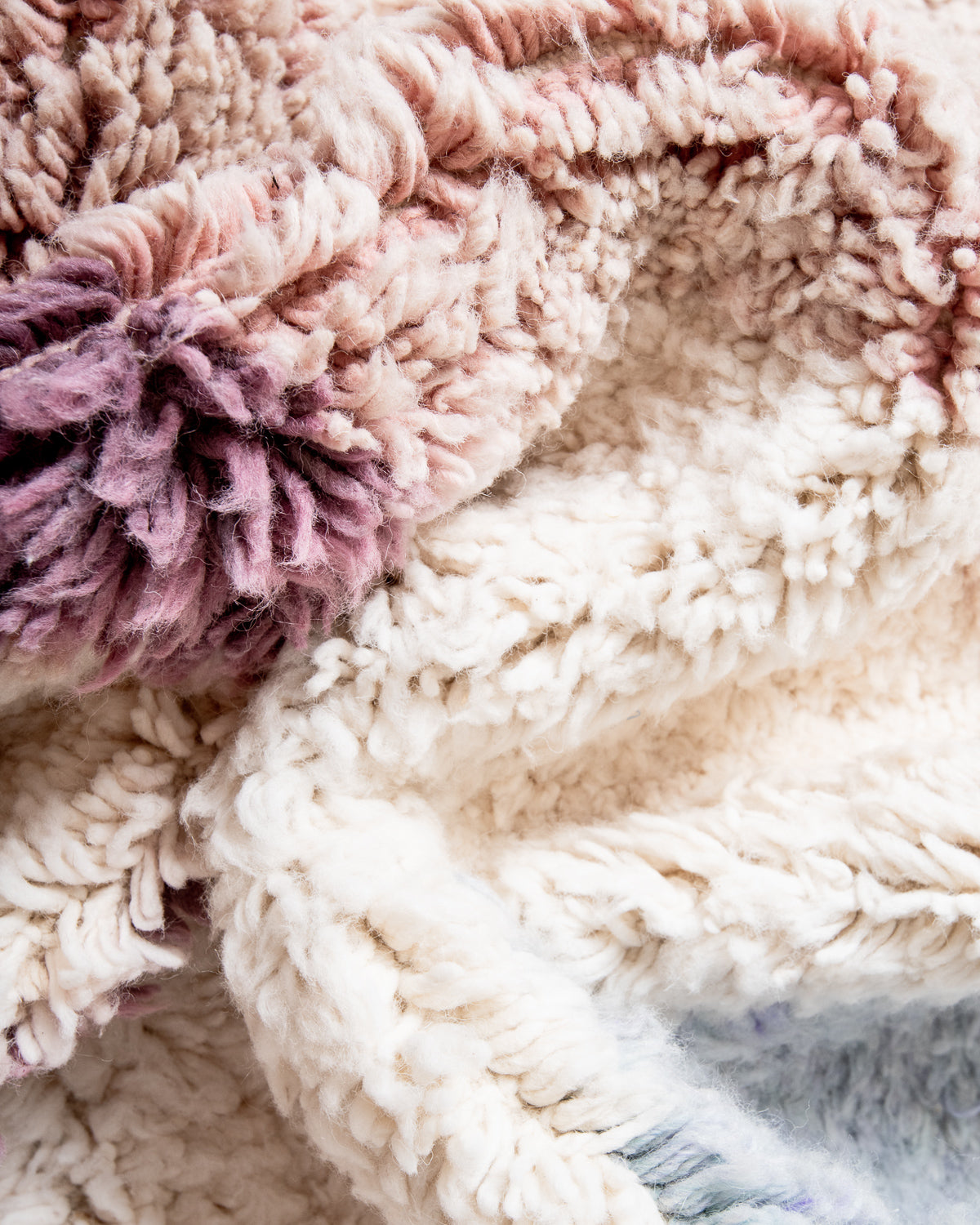 Modern, designer, handcrafted Berber rug from Morocco. Beniourain carpet with beautiful colours and patterns and fluffy wool texture.